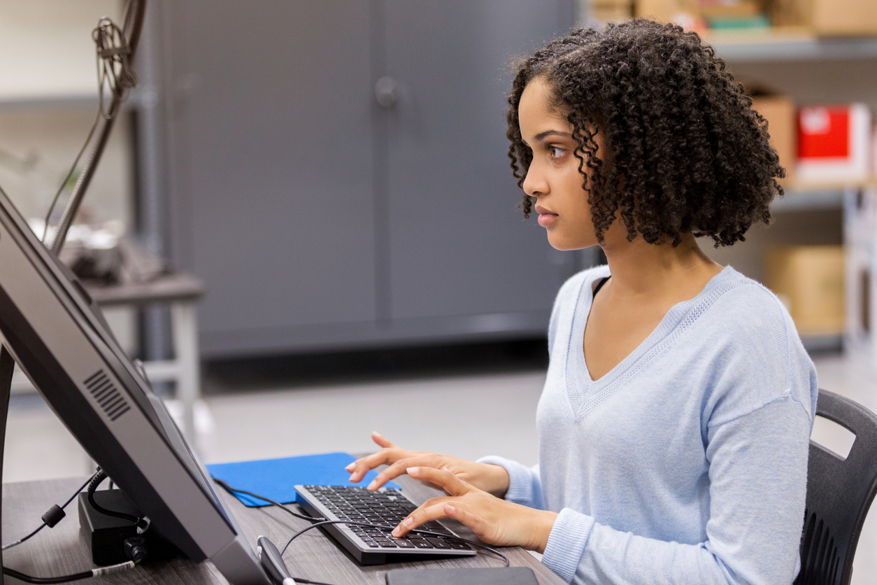student working on a computer